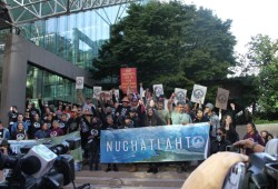 Nuchatlaht members and their supporters stand at the B.C. Supreme Court in 2022 while the case went to trial. The First Nation has indicated the possibility of an appeal to gain title over their whole traditional territory. (Eric Plummer photo)