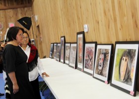 Framed copies line the wall of Alberni Athletic Hall