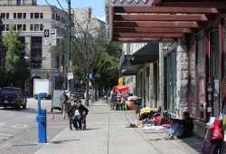 The most recent data from the B.C. Coroners Service shows that just 18 per cent of fatal overdoses occurred outside. Pictured is East Hastings Street in Vancouver. (Eric Plummer photo)