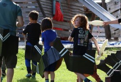 Children playing “Tla-o-qui-aht warriors” paddled in cardboard cutouts of dugout canoes around the wooden pirate ship play structure at Tofino’s Village Green to recount the fate of the Tonquin. The 269-ton American trade ship sank to the bottom of Clayoquot Sound in 1811 after being overwhelmed by the warriors – and blew up.