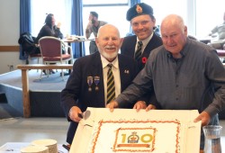 Warren “Whitey” Bernard, Tofino Legion Vice-President Riley Banks and Tofino Legion President Mike White celebrate the Legion’s centenary.