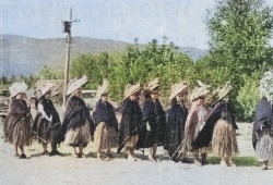 Originally published in Ha-Shilth-Sa Feb. 28, 1975, the caption for this photo reads "The ladies of Tse-shaht Tribe dancers in grass skirts. Left to right (late) Annie Watts, (late) Pearl Brown, Margaret Shewish, Jessie Gallic, Mabel Yokum, (late) Rose Dick, Mrs. Bill, (Sarah) Touchie, (late) Mrs. K. Joe and (late) Millie Thomas. (Colourized Ha-Shilth-Sa archive photo)