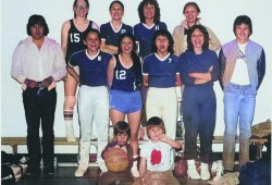 Coach Harvey Robinson, left, stands with the Ahousaht ladies Pacific Breeze ANBT championship team. His wife Doris is number 8. 