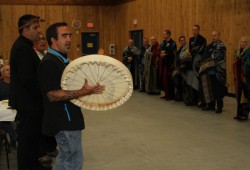 Tseshaht member Aaron Watts sings for the Tour de Rock riders.