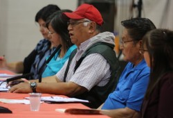 Archie Little speaks during the round table discussion to begin the forum.