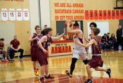 Armada's Cam Cyr jumps for a basket during a Jan. 9 Totem Tournament game against Kwalikum. 