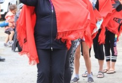 Members of the Pacheedaht First Nation dance for those who gathered at the sacred site.