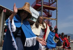 Tseshaht members dance at the historic winter village site of ƛuukᵂatquuʔis on July 6.