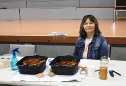 Deb Masso brought miniature cedar drums and cedar work to the career fair, complementing the event with traditional Nuu-chah-nulth crafts. 