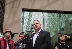 2.	Gord Johns, MP, speaks at a T’aaq-wiihak media event in Vancouver following the release of the ‘Justification Trial’ decision, April 2018. (Melody Charlie photo)