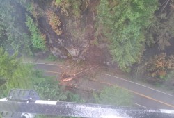 Burning in a steep mountainside slope, the Cameron Bluffs fire caused debris to fall onto Highway 4, leading the province to close the road for most of June. (B.C. Wildfire Management Branch photo)