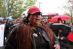 Lisa Watts speaks before the walk began at the Victoria Quay.