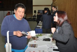 It wasn't just kids at the NETP Career Fair. Lory Campbell, left, checks out the programs at INEO Employment Services with marketing admin Ambar Varela.