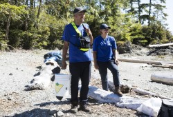 Hank Gus and Memphis Dick greet a group of kayakers on Gibraltar Island, in the Broken Group Islands.