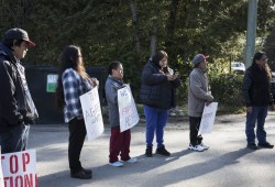 Tla-o-qui-aht First Nation members gathered in front of the nation’s main office near the Best Western Plus Tin Wis Resort in Tofino to protest recent housing evictions, on March 31, 2022.