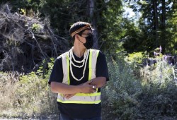 Timmy Masso, a member of the Tla-o-qui-aht First Nation, organized a road closure on West Main Forest Service Road to block tourists from accessing the road, near Tofino, on August 10, 2021. 