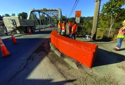 Many locals have still referred to the structure as “The Orange Bridge”, recalling its colour for decades before being painted grey in 1990. many locals still refer to the structure as “The Orange Bridge”, recalling its colour for decades before being painted grey in 1990. (Photo submitted by Ken Watts) 