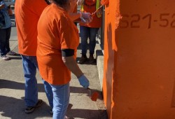 Residential school survivors Wally and Donna Samuel took part in painting the bridge before the National Day for Truth and Reconciliation. (Photo submitted by Ken Watts) 