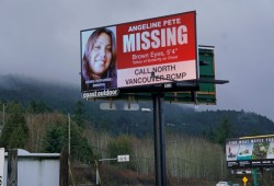 An electronic billboard on the Island Highway near Nanoose Bay shows missing Indigenous woman Angeline Pete. (Karly Blats photo)