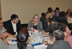 ACRD chair and Huu-ay-aht member John Jack (left) attends a table discussion with recorder Tannis Feltrin (City of Port Alberni), centre, and facilitator Keith Hunter, right.