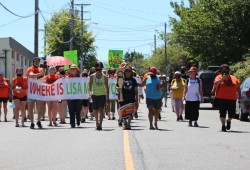 Loved ones and supporters hold the annual walk for Lisa Marie Young in Nanaimo on June 26, 2021. The Tla-o-qui-aht woman has been missing without a trace since 2002. According the NTC President Judith Sayers, 53 Nuu-chah-nulth women have been murdered or died under suspicious circumstances, and two remain missing. (Eric Plummer photo)