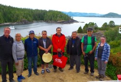 Mowachaht Muchalaht elders after a blessing ceremony on San Rafael Island at Yuquot, flanked by MMFN administrator Kevin Kowalchuk and archeologist Colleen Parsley. From left, Kowalchuk, Margarita James, Anthony Dick, Bruce Mark, Bill Howard, Leonard Mark, Edwin Jack and Parsley. (Submitted photo)