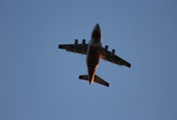 As the sun set air tankers circled over the Alberni Inlet, dropping retardant on the forest fire. (Eric Plummer photos)