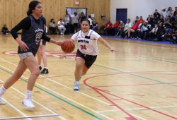 Nupps Clan player Anita Charleson flies down the court in jersey No. 34. 