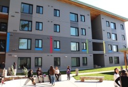 People enjoy a courtyard behind the Citaapi Mahtii complex at 4210 Cedarwood Street in Port Alberni. 