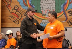Tofino Mayor Dan Law and Tla-o-qui-aht Chief Elmer Frank shake hands after signing a renewed protocol agreement on Sept. 30, 2025. The agreement acknowledges Tla-o-qui-aht as the original inhabitants of the lands in which Tofino exists within. 