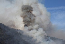 After starting near the shore of Cameron Lake, the forest fire climbed Wesley Ridge, reaching the other side of the slope. (Eric Plummer photo)