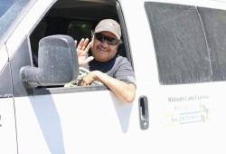 Gerry Peter waves from his shuttle, the Nitinaht Lake Express, which takes hikers from the Bamfield junction to Nitinaht Lake or anywhere else on the Island they need to go.