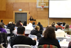 Gisele Martin engages the audience with a talk about traditional food.