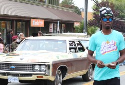Hotel Zed Tofino staffers participate in the Tla-o-qui-aht Days parade through Tofino on Aug. 10. (Nora O’Malley photo)