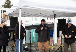 Tseshaht Chief Councillor Ken Watts speaks to participants before the walk.