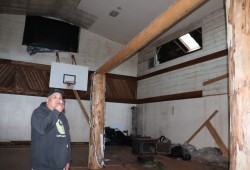 Former students were invited to look inside the gym before demolition began, taken in small groups of two or three. They were allowed to break things if they wanted to.