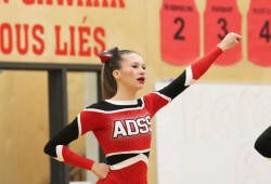 Mia Foster, a Hupacasath member, performs with the cheer team at the final game.