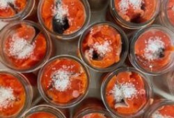 Salmon is pictured in jars to be preserved, a technique First Nations have adopted in modern times.