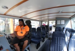 The boat can transport 13 people, including a skipper and first mate. It is fully enclosed, has heating and a bathroom. 