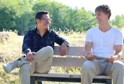 Jason Sam sits with $40,000 Pacific Rim Foundation Dick Close scholarship winner Hugh Clouthier. 