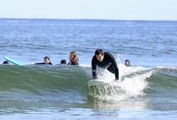 KC Hale goes for a friendly wave during a Monday mułaa practice.
