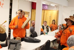 Maquinna leads the Dinner Song with his family.