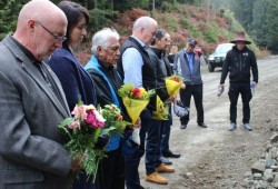 Bamfield ACRD Director Bob Beckett, Port Alberni Mayor Sharie Minions, former Huu-ay-aht chief councillor Robert Dennis, former premier John Horgan, Head Hereditary Chief Derek Peters, and former MLA Scott Fraser take a moment to remember the lives lost on the Bamfield Road Nov. 14, 2019. Huu-ay-aht Councillor Edward R. Johnson and Hereditary Chief Jeff Cook perform a prayer. (Heather Thomson/Huu-ay-aht First Nations photo)