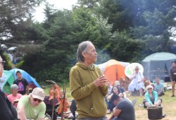 Yahtloah, Tyee Ha’wilth Mike Maquinna, address his First Nation and visitors at Yuquot on Aug. 2.