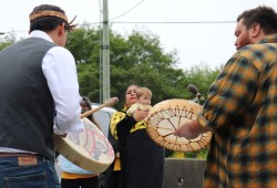 Moore’s family members Hjalmer Wenstob and Timothy Masso performed the Healing Song for Moore's loved ones they began to walk on the overcast Wednesday morning.