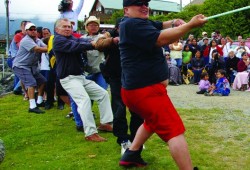 Volunteers, including MLA Scott Fraser, raised the pole in Tofino before it was moved to its final location at Homiss.