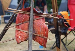 Food for Yuquot Summerfest was cooked outside, including barbecued salmon. 
