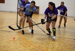 Alert Bay's Bench Warmers fight with Port Alberni's All Nations for the ball.