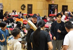 Kyuquot First Nation Brandon Johnson sings his heart out during the Dec. 11 Campbell River urban holiday gathering.