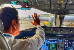 Wallace Watts, among one of the first Indigenous pilots hired by a commercial airline, spent his career travelling the globe. He is pictured during his last commercial flight with United Airlines in December. (Facebook photo)